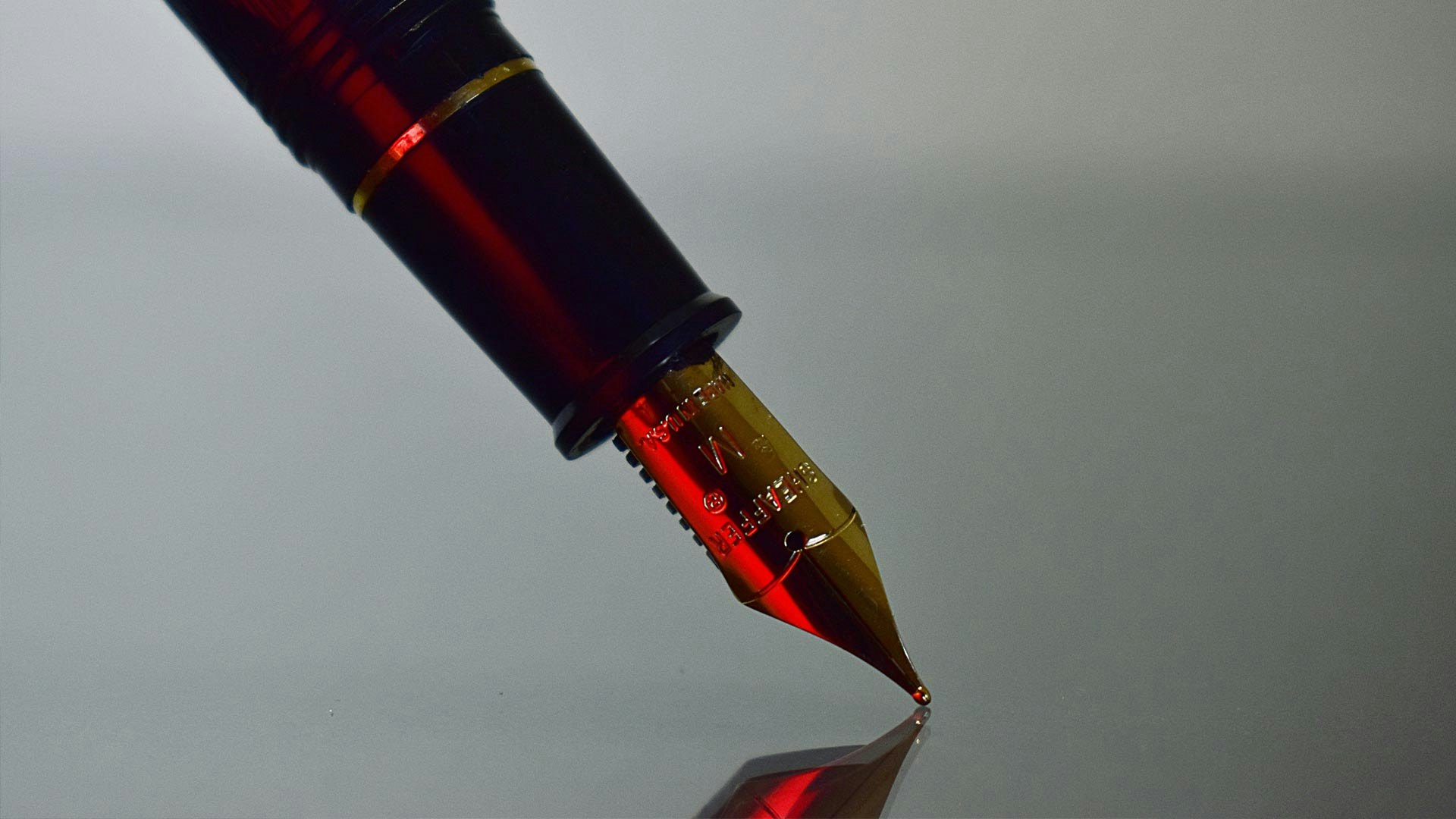 Pen Writing on Paper